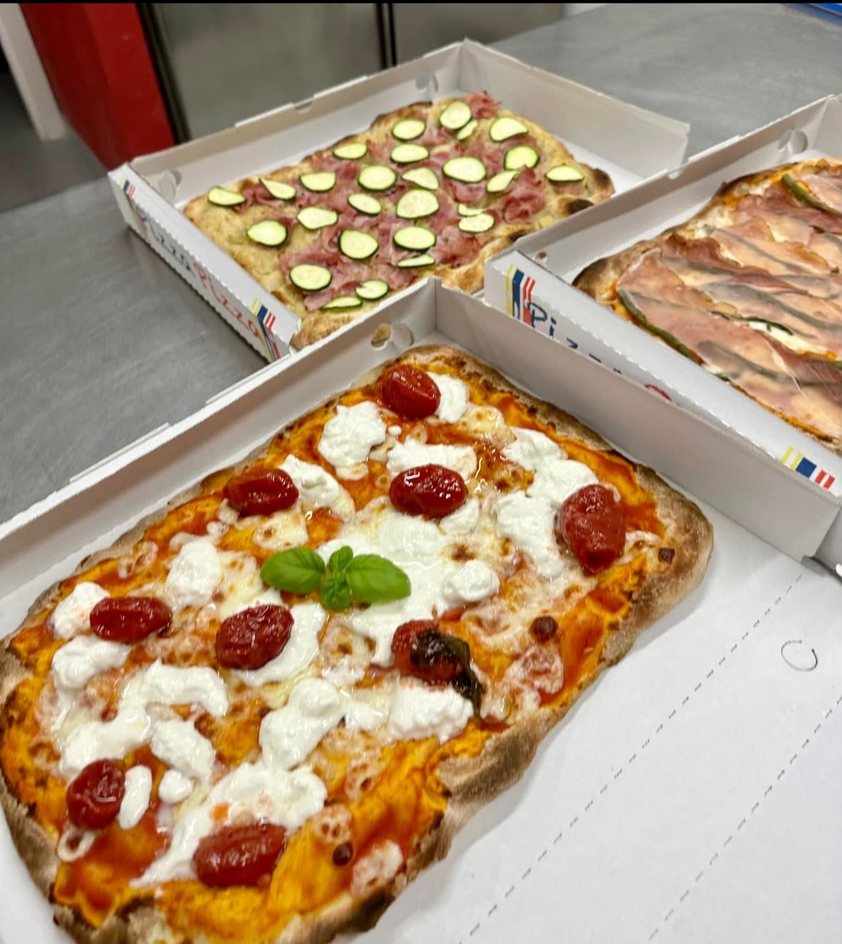 Pizze alla pala appena sfornate